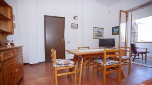 Apartment, 3 Bedrooms | In-room dining - Quadrilocale San Teodoro con Terrazza (San Teodoro)