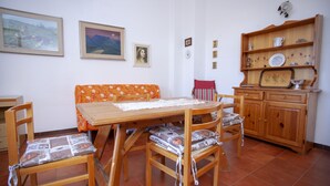 Apartment, 3 Bedrooms | In-room dining - Quadrilocale San Teodoro con Terrazza (San Teodoro)