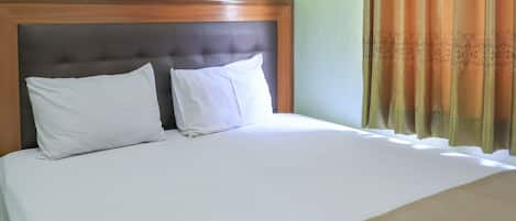 Habitación Deluxe | Escritorio, wifi gratis, ropa de cama