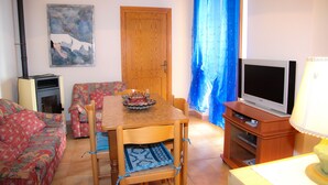 Apartment, 2 Bedrooms | Living area - Villette Budoni Vicino al Mare (Olbia)