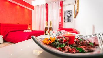 Superior Triple Room | Minibar, in-room safe, individually decorated, individually furnished