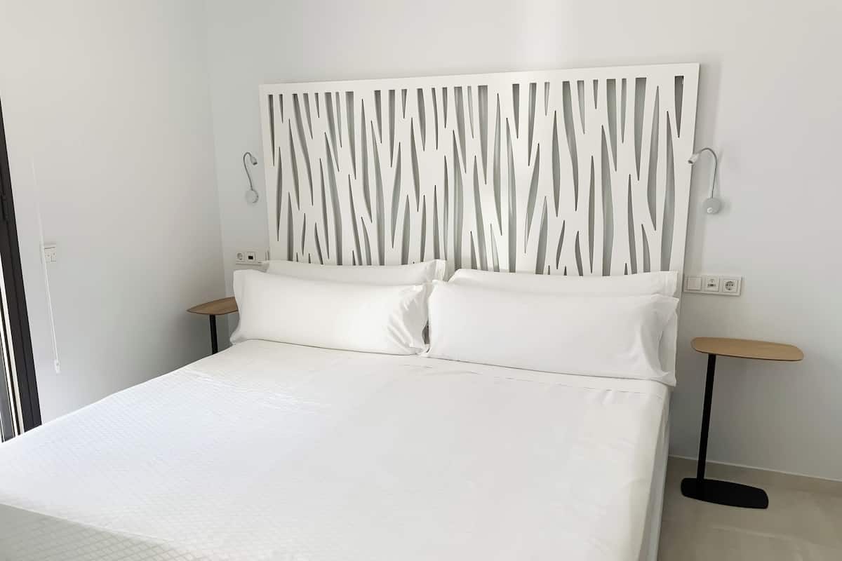 Penthouse, 2 Bedrooms, Pool View | 1 bedroom, down duvets, memory-foam beds, individually decorated