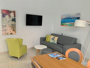 Apartment, 1 Bedroom | Living area | Smart TV, MP3 dock - Feelathome Rivero Apartments (Seville)