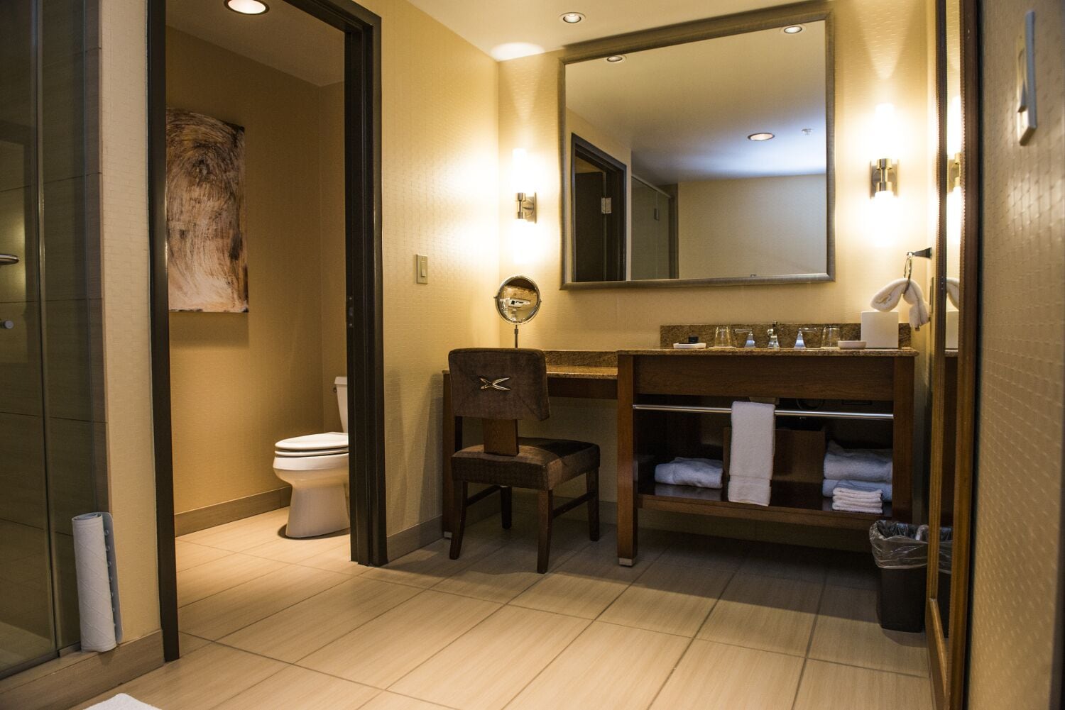 designer toiletries, hair dryer, towels, soap