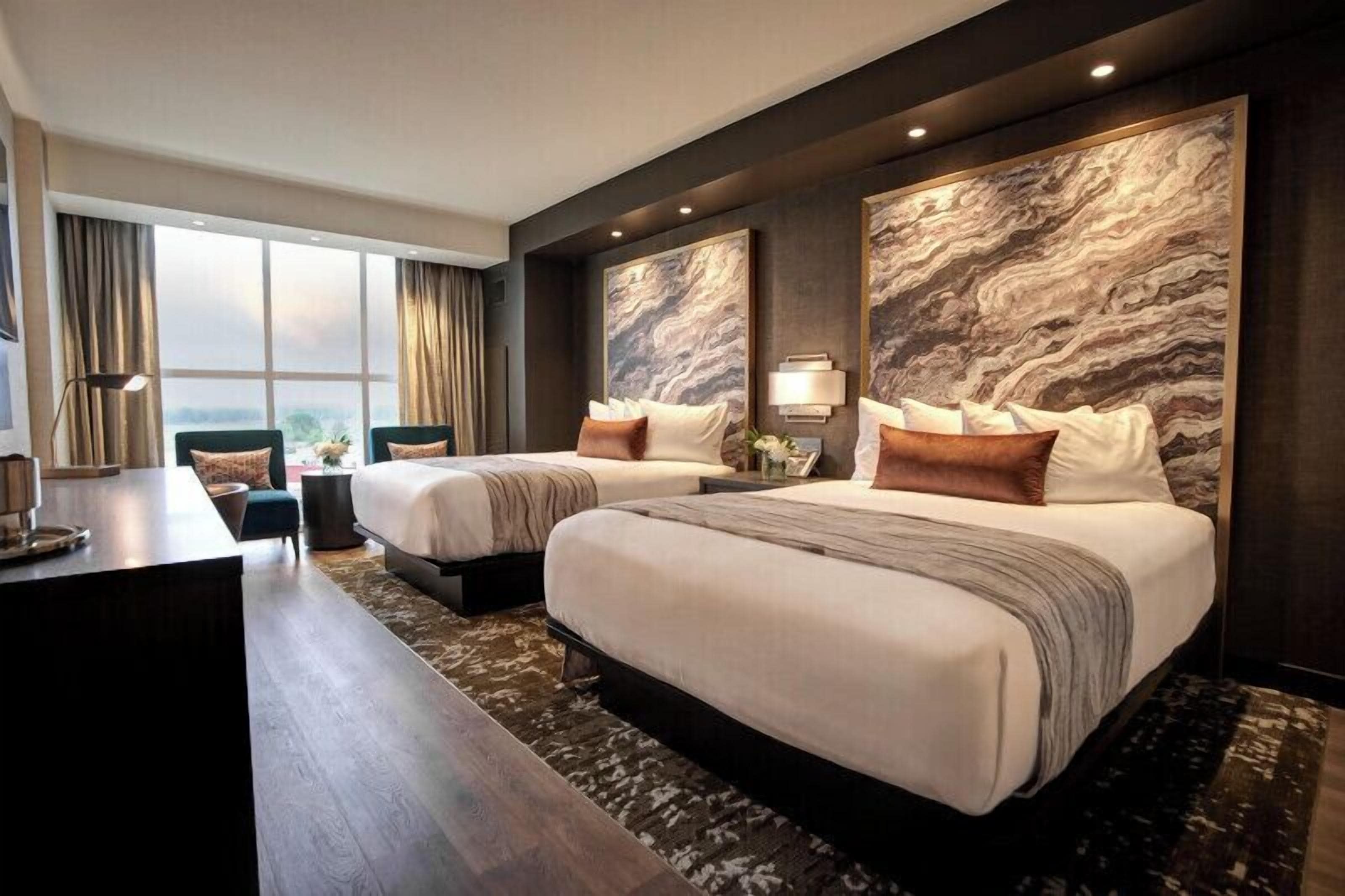 Hypo-allergenic bedding, in-room safe, laptop workspace