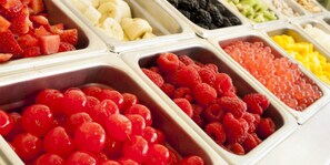 A variety of fresh fruits in a buffet setting. - Wind Creek Casino & Hotel Atmore (Atmore)