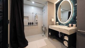 Accessible Deluxe Two Queen Non-Smoking | Bathroom | Designer toiletries, hair dryer, towels, soap