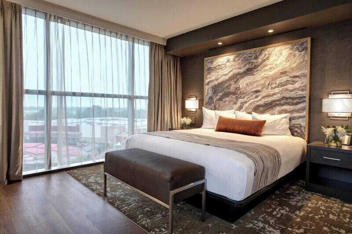 Hypo-allergenic bedding, in-room safe, laptop workspace