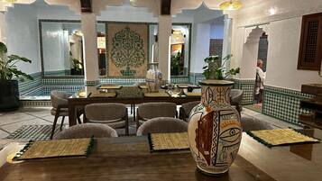 32-inch flat-screen TV with satellite channels, TV