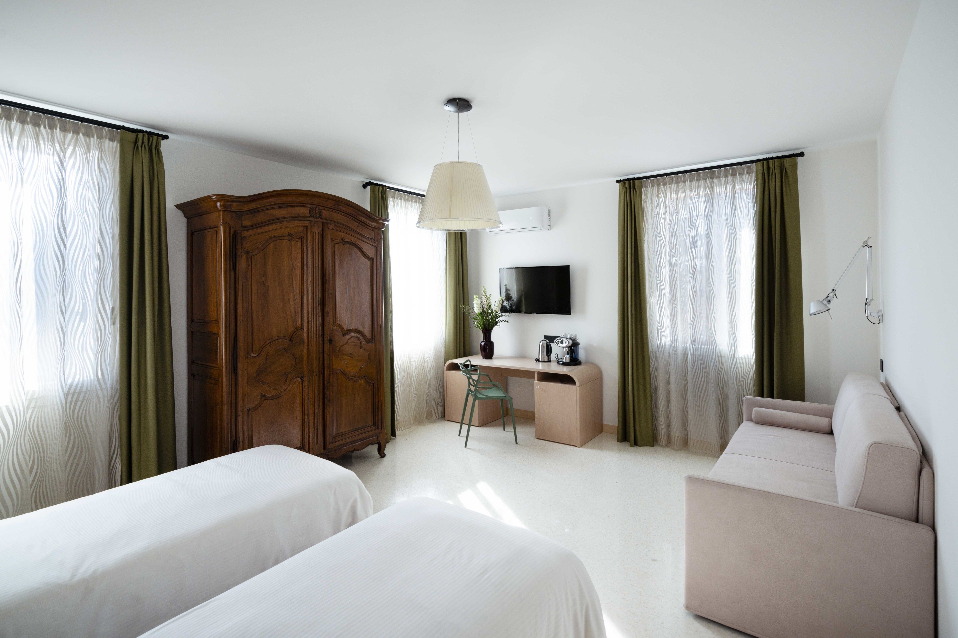 Suite estudio Deluxe, con acceso para personas discapacitadas (Junior) | Sábanas italianas Frette, ropa de cama de alta calidad y edredón 