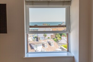 Suite, Sea View | Hypo-allergenic bedding, in-room safe, blackout drapes - Porthole Suites (St. Brelade)