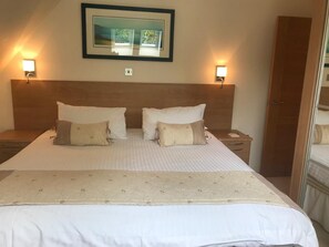 Hypo-allergenic bedding, in-room safe, blackout curtains