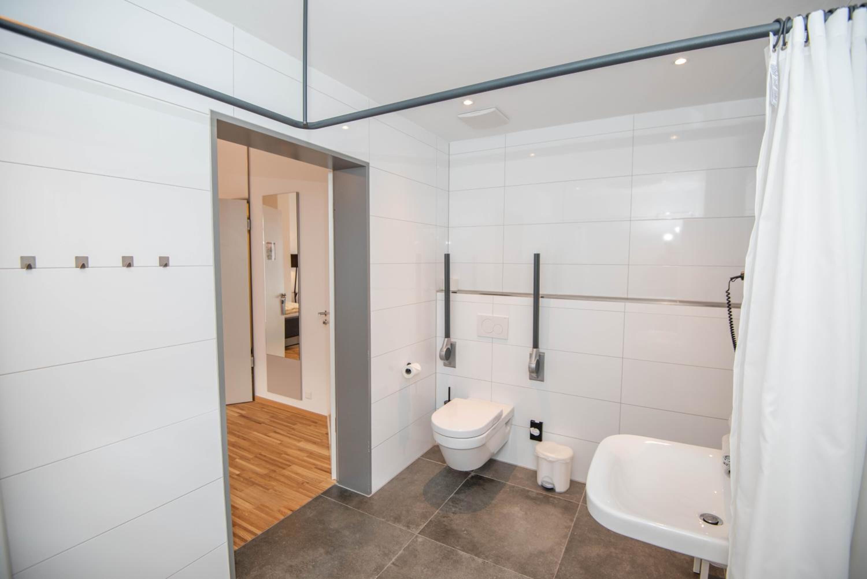 shower, free toiletries, hair dryer, slippers