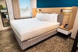 Suite, 1 King Bed | In-room safe, desk, iron/ironing board, cribs/infant beds