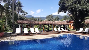 Outdoor pool, open 10:00 AM to 10:00 PM, pool loungers