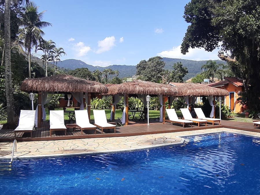 Outdoor pool, open 10:00 AM to 10:00 PM, pool loungers