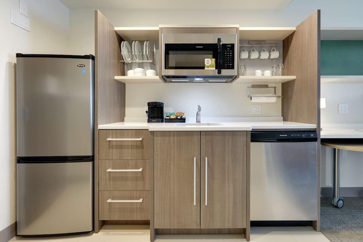 full-sized fridge, microwave, dishwasher, coffee/tea maker