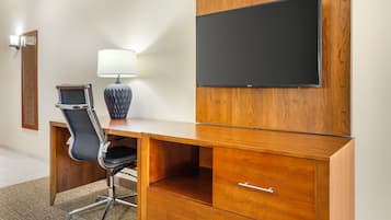 Desk, laptop workspace, blackout drapes, iron/ironing board
