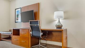 Desk, laptop workspace, blackout drapes, iron/ironing board