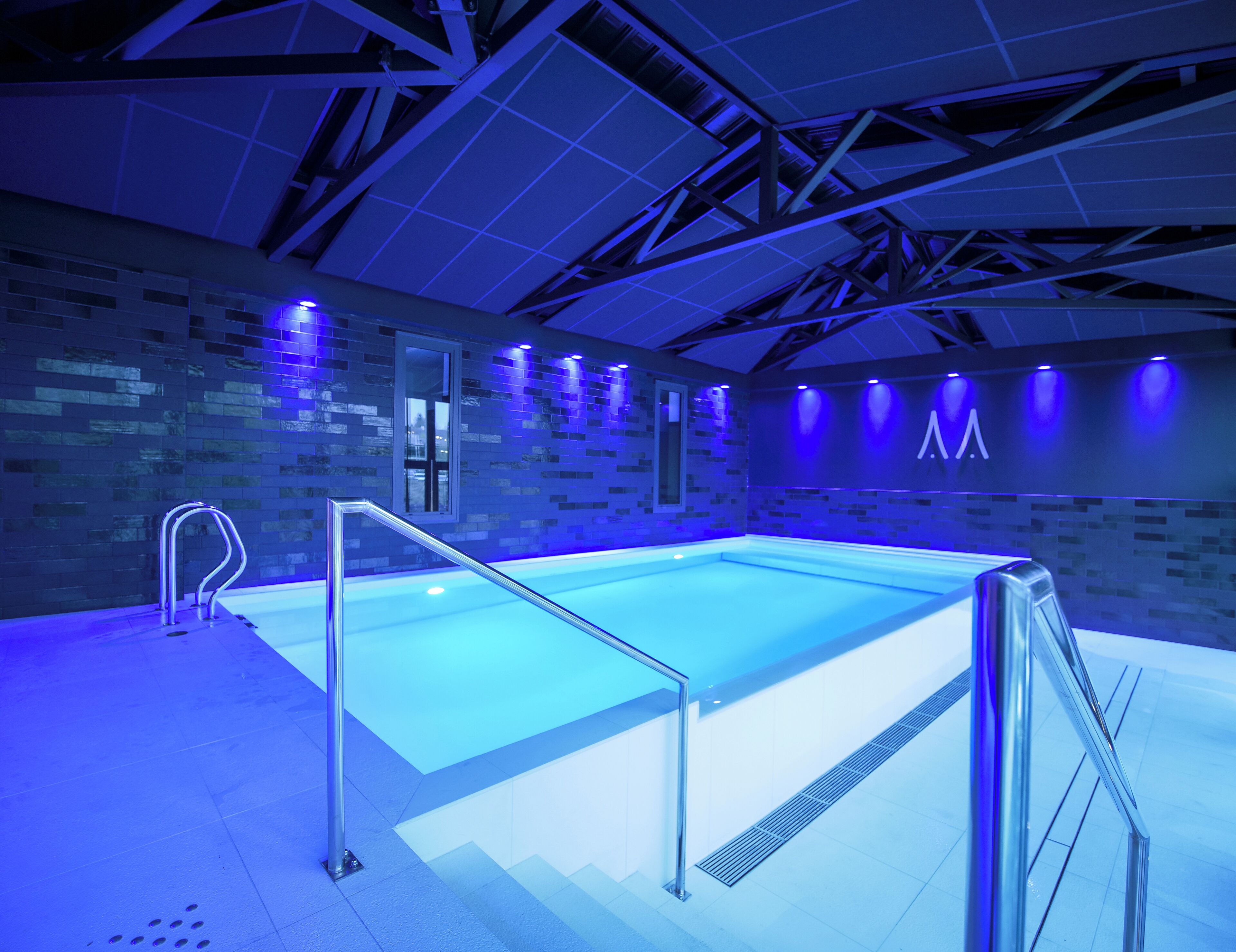 indoor pool, open 7:00 am to 10:00 pm, pool loungers