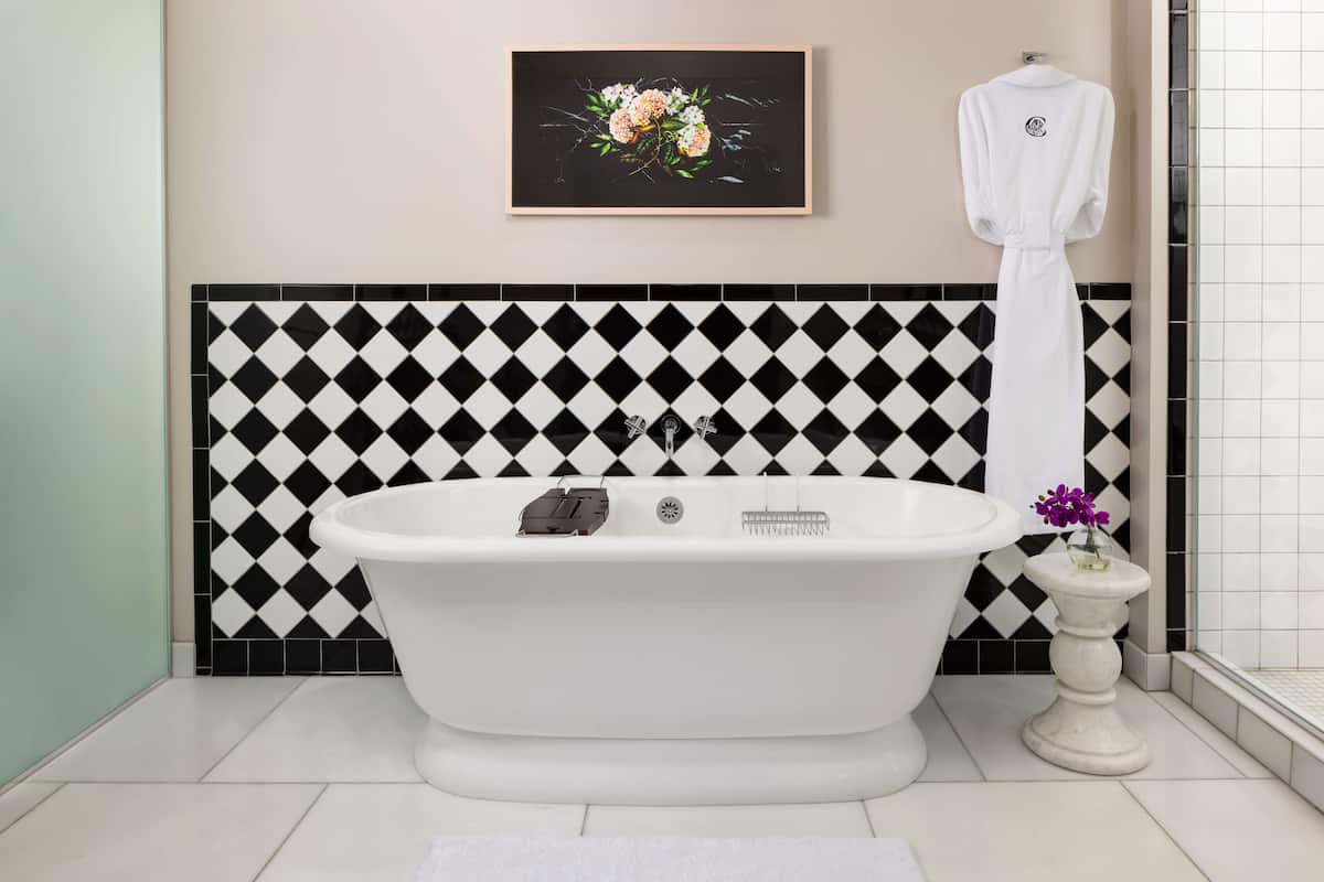 combined shower/bathtub, rainfall showerhead, designer toiletries