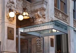 The Candler Hotel entrance with ornate carvings and a glass canopy. - The Candler Hotel Atlanta, Curio Collection by Hilton (Atlanta)