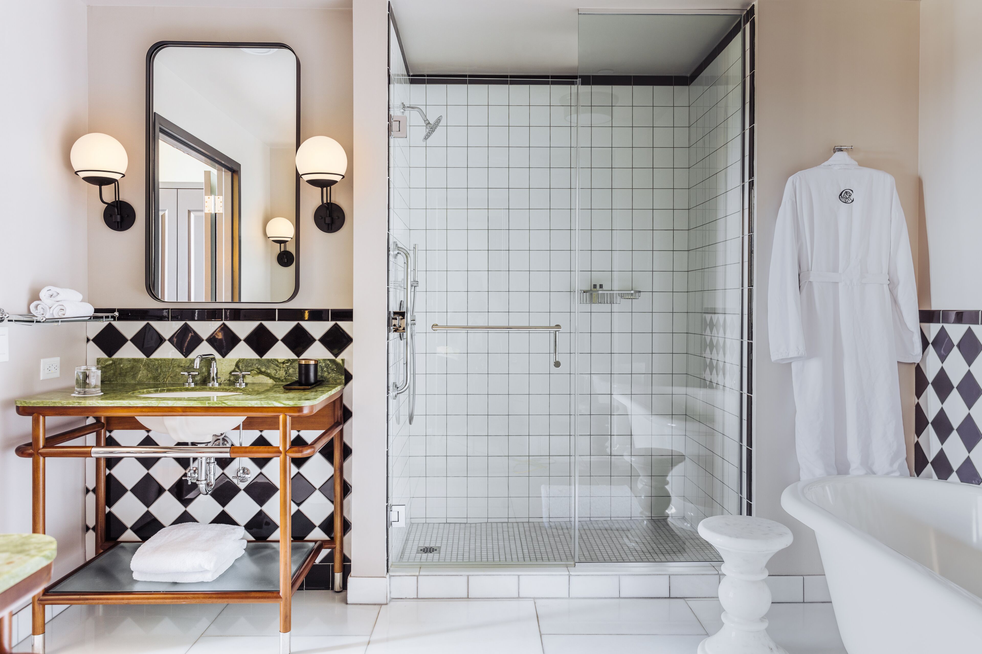 combined shower/bathtub, rainfall showerhead, designer toiletries