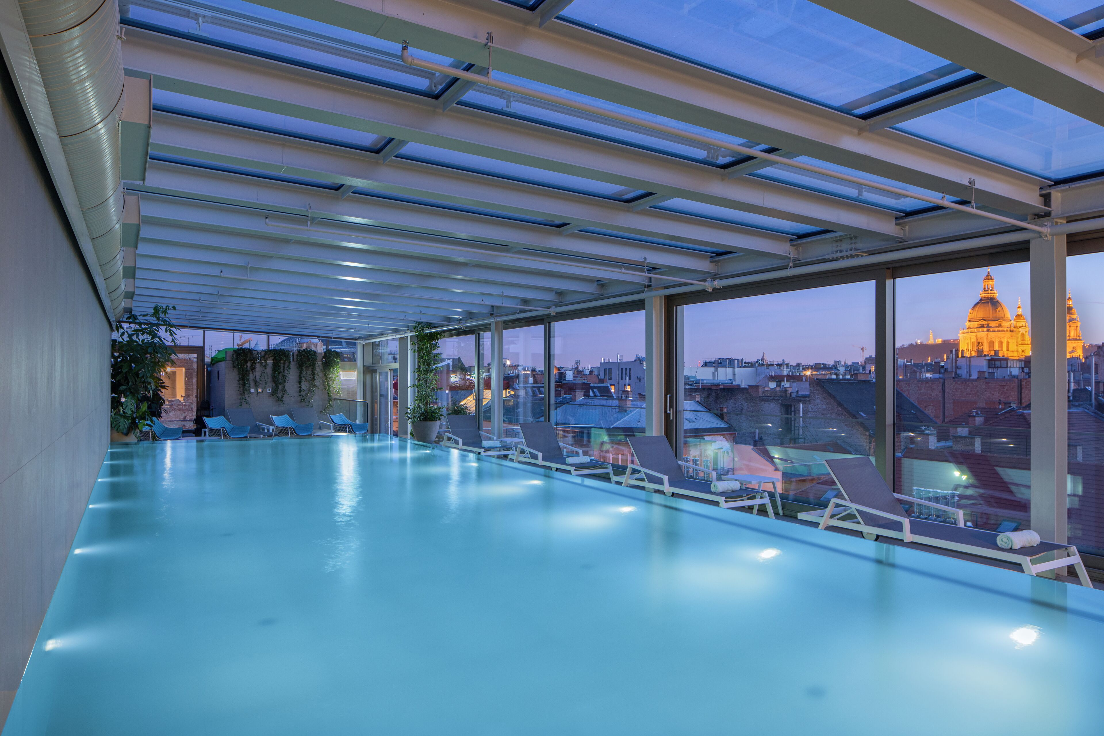 Indoor pool, open 6:00 AM to 10:00 PM, sun loungers