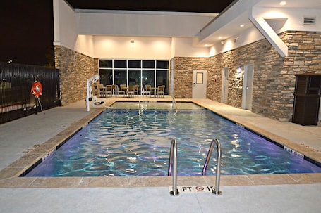 Outdoor pool, open 7:00 AM to 10:00 PM, sun loungers