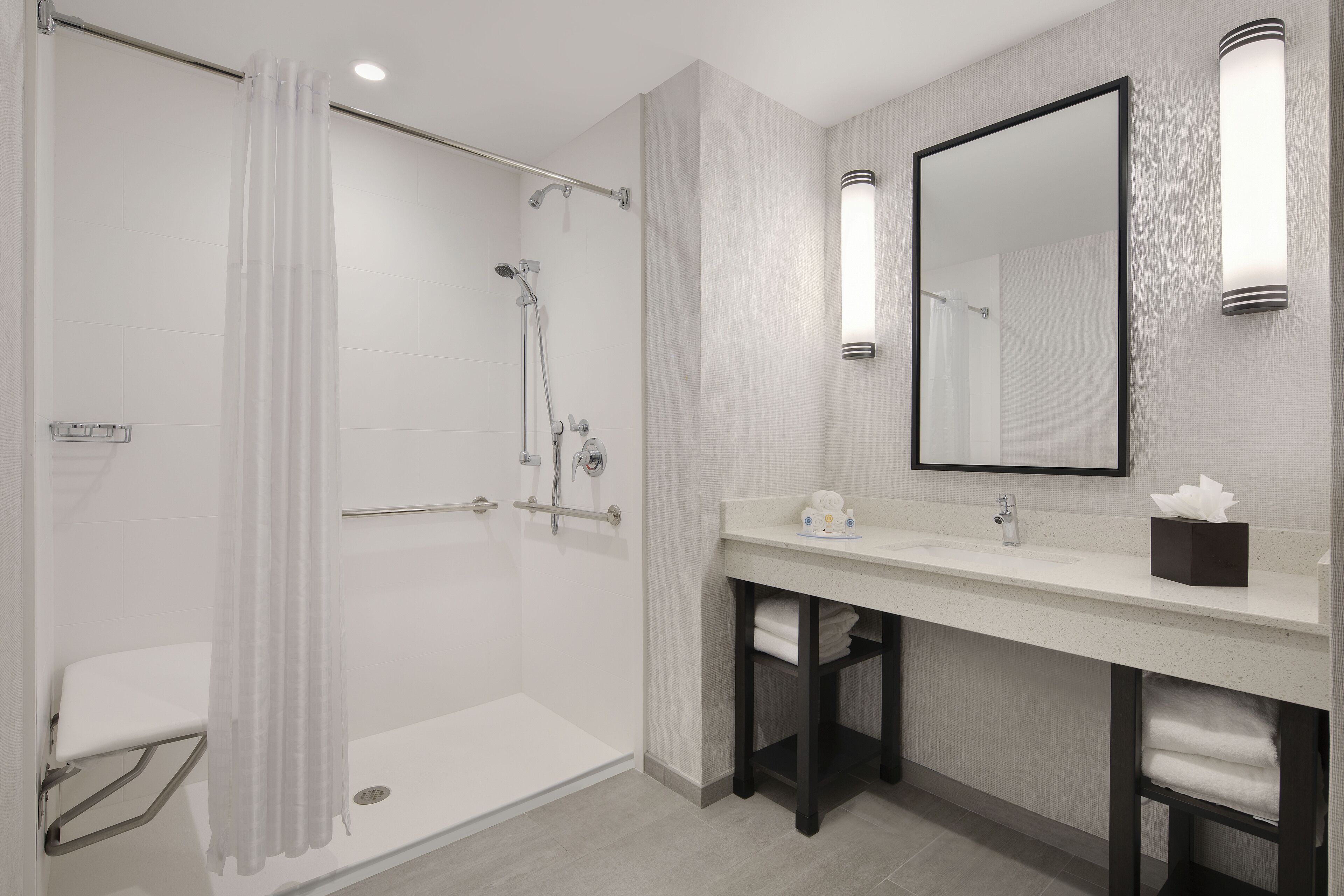 combined shower/bathtub, free toiletries, hair dryer, towels