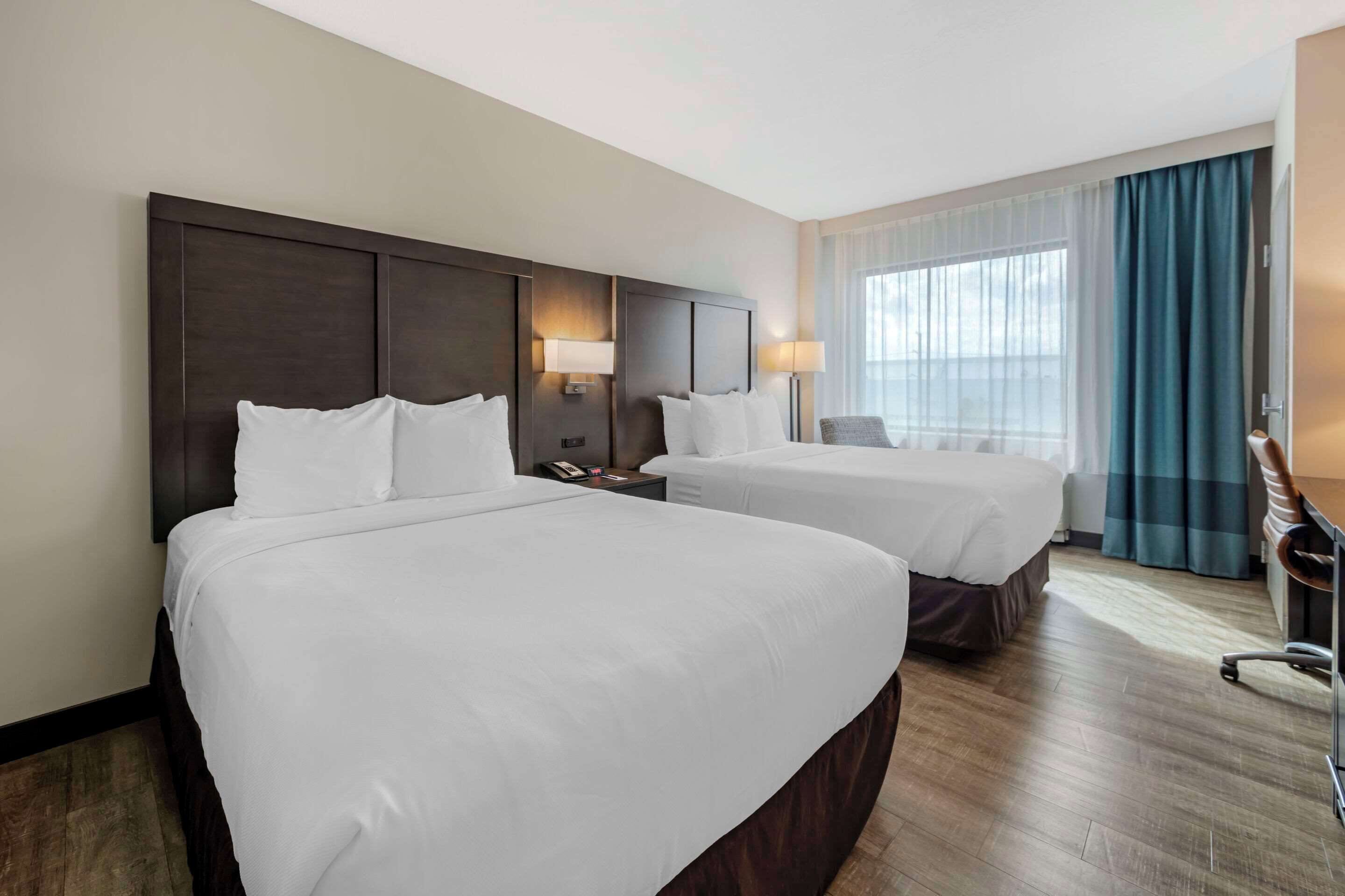 standard room, 2 queen beds, non smoking | desk, laptop workspace, blackout curtains, soundproofing