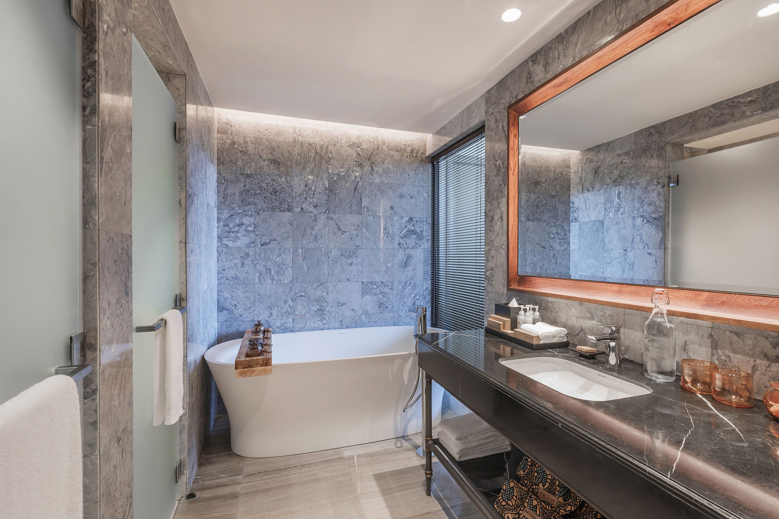 separate bathtub and shower, hair dryer, bathrobes, slippers