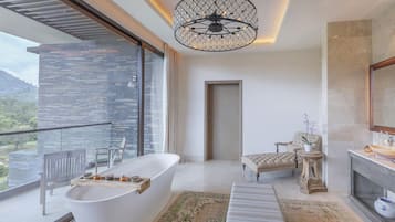 Separate bathtub and shower, hair dryer, bathrobes, slippers