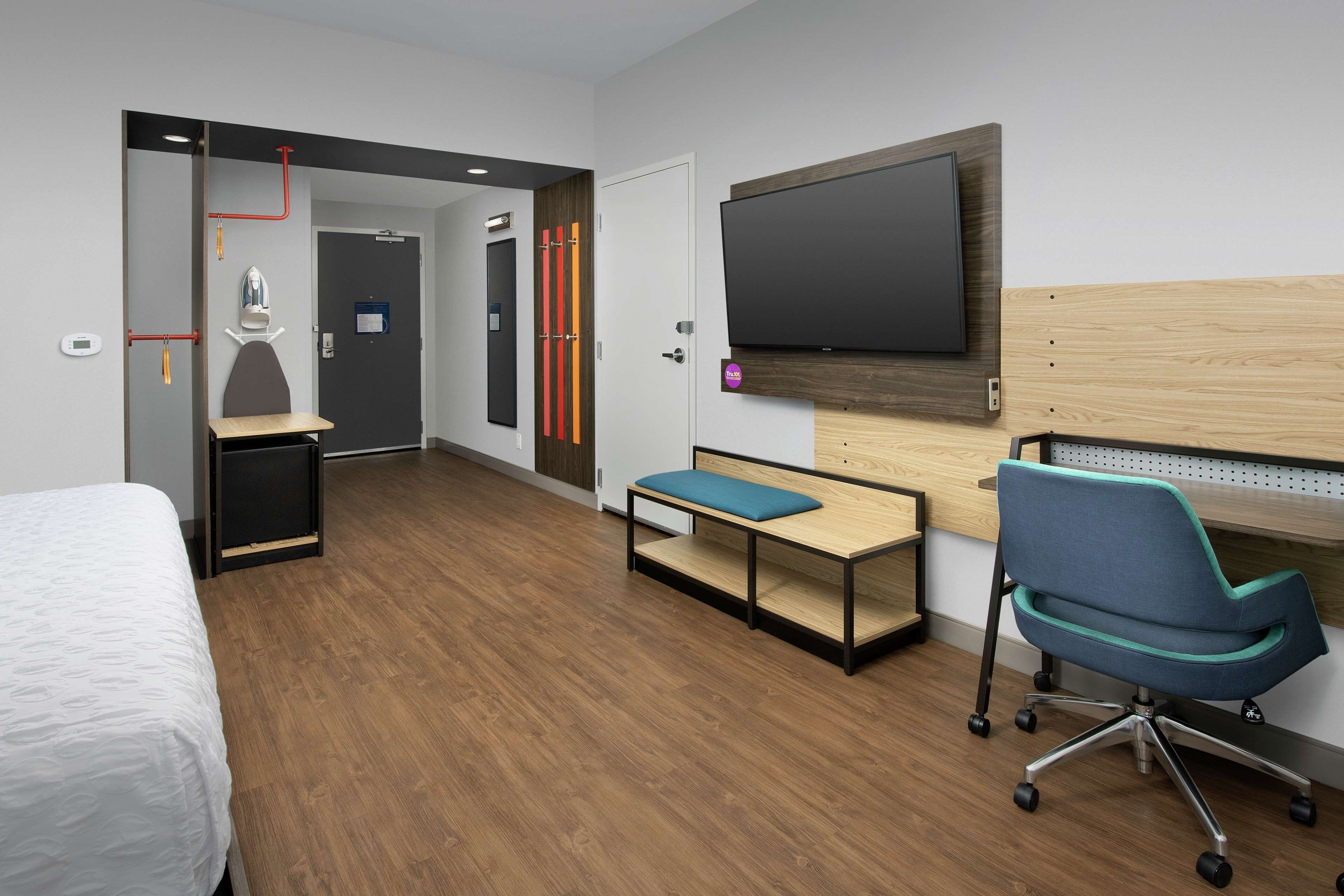 desk, laptop workspace, blackout curtains, iron/ironing board