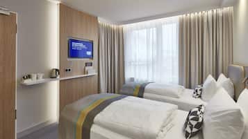 Standardzimmer, 2 Einzelbetten | Schreibtisch, VerdunkelungsvorhÀnge, schallisolierte Zimmer