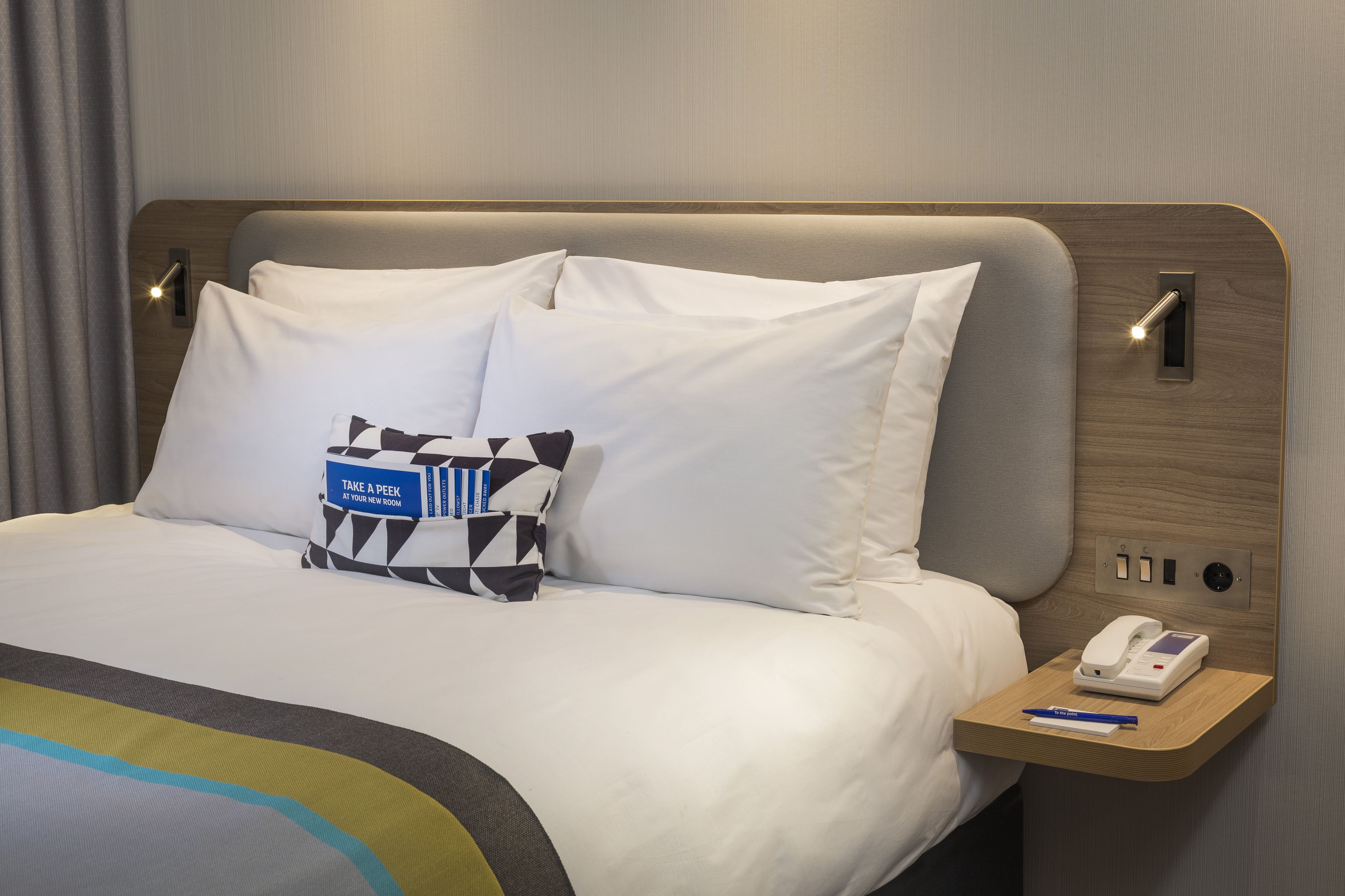 Desk, blackout curtains, soundproofing, rollaway beds