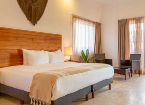 Premium Suite, 1 King bed with Sofa bed, Pool view | Minibar, in-room safe, blackout drapes, iron/ironing board