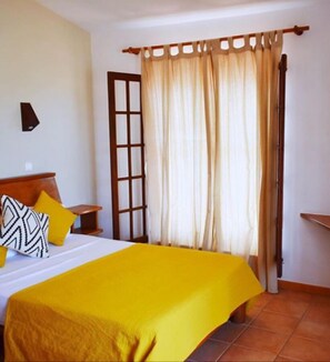 Premium bedding, minibar, in-room safe, free cribs/infant beds - Orquidea Guest House (Boa Vista)