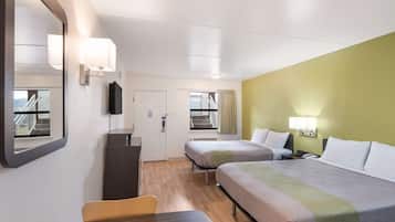 Desk, laptop workspace, blackout drapes, iron/ironing board