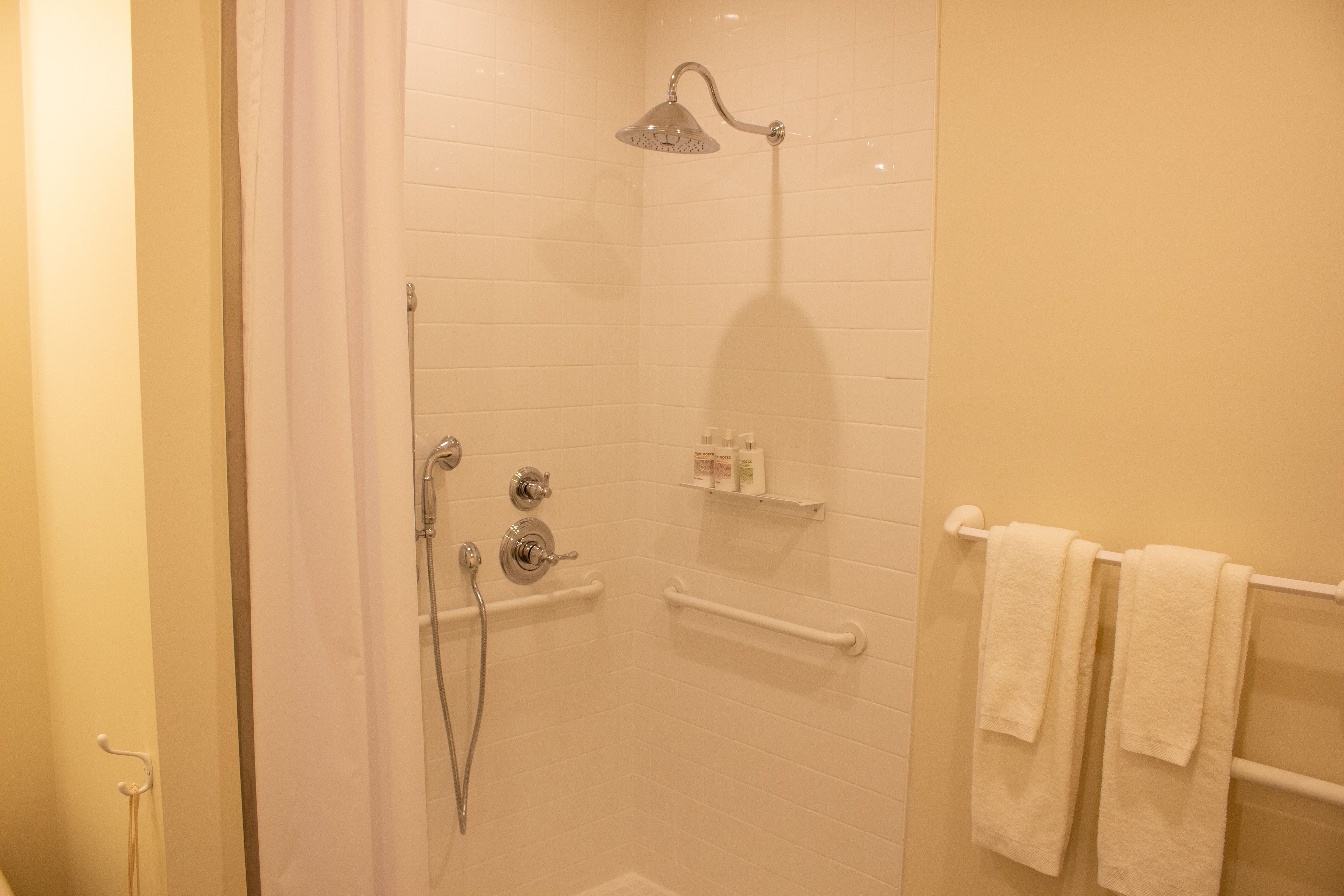 first floor, accessible | bathroom | combined shower/bathtub, towels