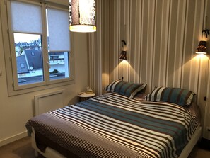 2 dormitorios, tabla de planchar con plancha, wifi gratis y ropa de cama