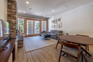 Suite, Multiple Beds, Non Smoking, City View | Living area | Flat-screen TV, fireplace, DVD player