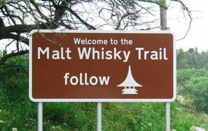 A sign welcoming visitors to the Malt Whisky Trail. - The Mill House Hotel (Buckie)