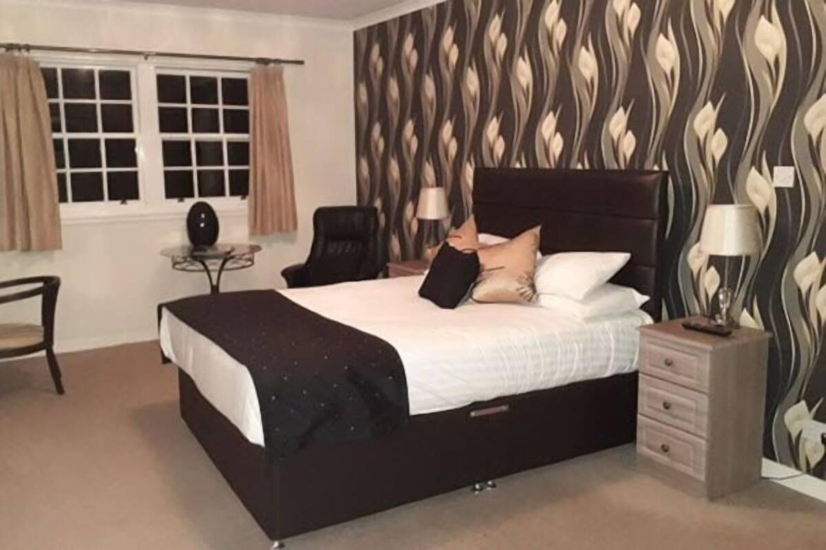 Blackout drapes, iron/ironing board, WiFi (free), bed sheets