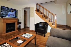 Smart TV, DVD player, table football, books