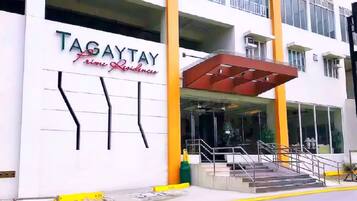 A building with a sign reading 'TAGAYTAY Prime Residences'.