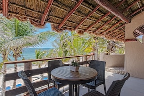 Outdoor dining - 2BD  5-guest Unique Condo Beachfront (Tulum)