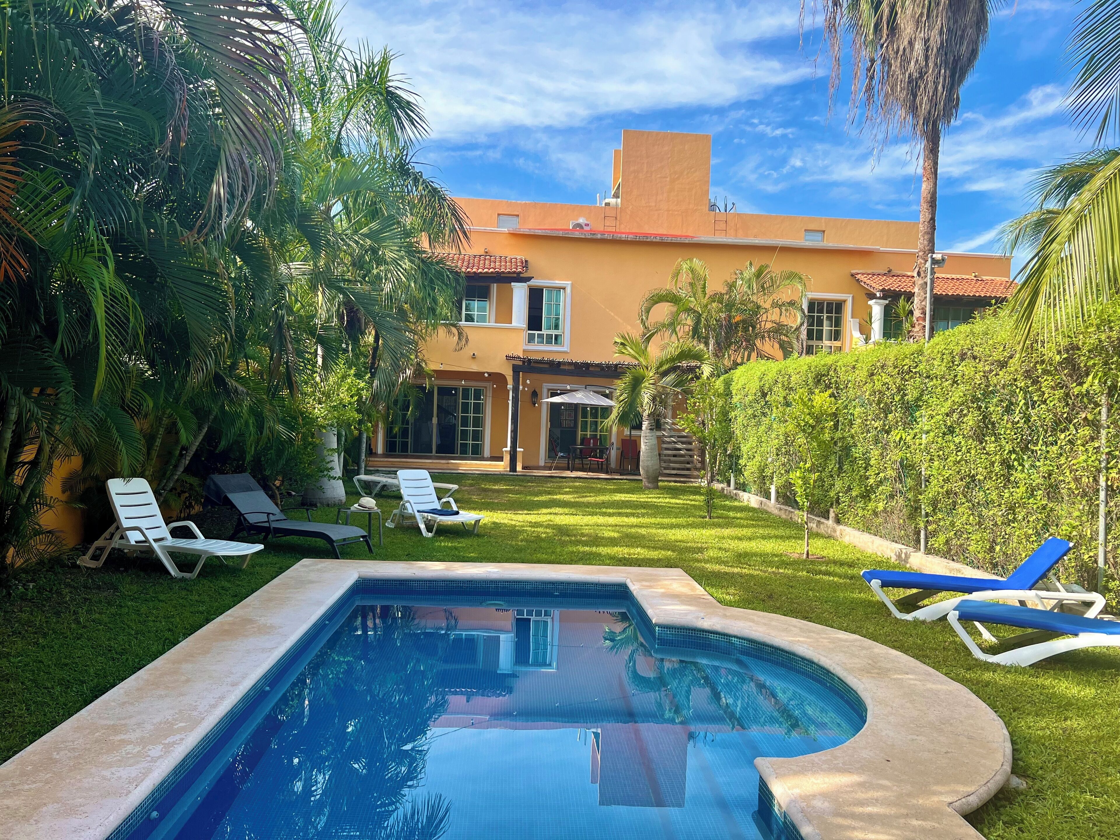 Outdoor pool, open 8:00 AM to 10:00 PM, sun loungers