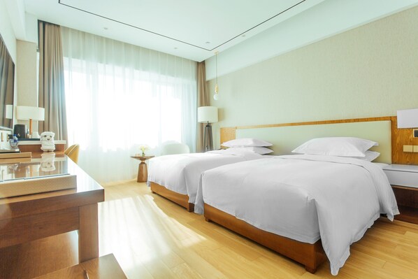 ห้องดีลักซ์, เตียงควีนไซส์ 1 เตียง, ปลอดบุหรี่, วิวชายหาด | ตู้นิรภัยในห้องพัก, โต๊ะทำงาน, ผ้าม่านกันแสง, เตารีด/โต๊ะรีดผ้า