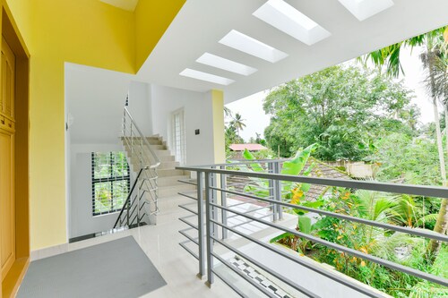 Luxurious 2 BHK house amid lush greenery and in a village like atmosphere.